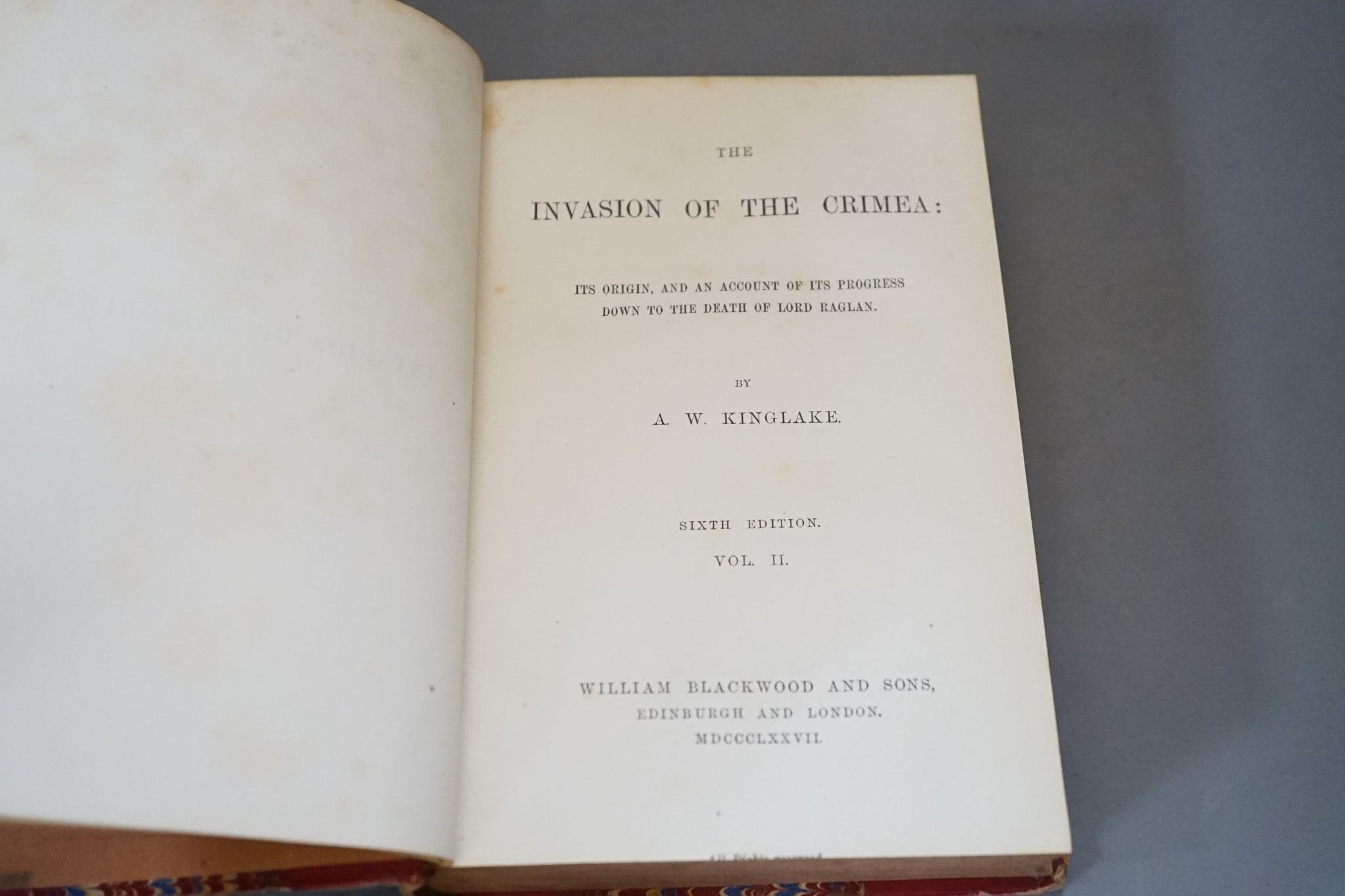 Kinglake, A.W. - The Invasion of the Crimea ... Cabinet Edition, 6 vols, numerous maps and plans (some coloured and folded), half titles; contemp. red half calf and marbled boards, gilt-panelled spines,cr.8vo. 1877